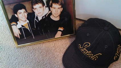 Mike Russo (left), two of his best friends, Eric and Lance, and his favorite hat. You are greatly missed, Mike.