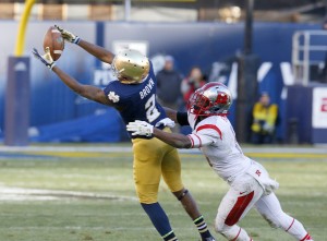 Bronx, New York, 12/28/13 Notre Dame #2 Chris Brown completes a catch in the third quarter during the annual Pinstripe Bowl football game at Yankee Stadium on December 28, 2013. (Paul J. Bereswill)