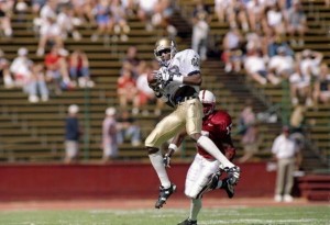 Oct 4, 1997: Notre Dame wide receiver Bobby Brown catches the ball as Stanford defensive back Corey Hill hits him during a game at Stanford Stadium in Palo Alto, California. Stanford won the game, 33-15. (Otto Greule /Allsport)