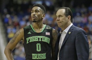 Eric Atkins and Mike Brey look on as the Irish fall to Wake Forrest in the ACC tournament. (AP Photo/Gerry Broome)