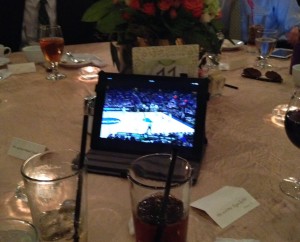 Half of the setup at Table 11. The other iPad is hidden and propped behind the centerpiece.