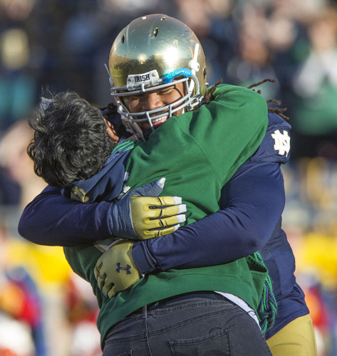 Notre Dame’s Sheldon Day (91) hugs his mother during Senior Day before the Notre Dame-Wake Forest NCAA college football game on Saturday, Nov. 14, 2015, at Notre Dame Stadium in South Bend. SBT Photo/ROBERT FRANKLIN