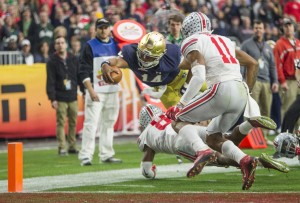 Notre Dame’s DeShone Kizer (14) leaps near the end zone during the 2016 Fiesta Bowl on Friday, Jan. 1, 2016, at the University of Phoenix Stadium in Glendale, Ariz. South Bend Tribune Photo/ROBERT FRANKLIN