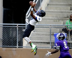 First Coast Buccaneers receiver Kevin Stepherson makes a catch over Gainesville Hurricanes defender RaiJuahn Alexander. (Matt Stamey photo)