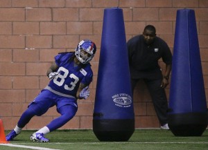New York Giants defensive end Ishaq Williams runs through a drill during NFL football rookie camp, Friday, May 6, 2016, in, East Rutherford, N.J. (AP Photo/Julie Jacobson)