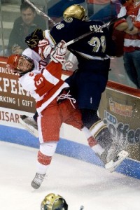 Boston University's Dave Warsofsky and Notre Dame's Ian Cole collide (photo: Melissa Wade)