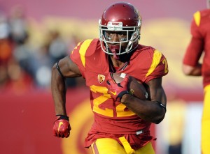 Trojans running back Justin Davis (22) runs the ball against the Utah Utes Credit: Gary A. Vasquez - USA TODAY Sports