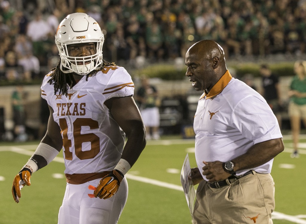 Texas linebacker Malik Jefferson and head coach Charlie Strong (RODOLFO GONZALEZ / AMERICAN-STATESMAN)