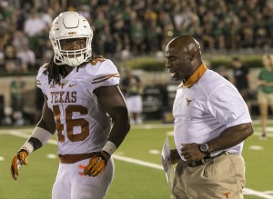 Texas linebacker Malik Jefferson and head coach Charlie Strong