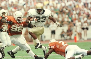 Autry Denson carries the ball during the 1996 matchup with the Texas Longhorns. Credit: South Bend Tribune