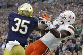 Notre Dame‘s Donte Vaughn breaks up a pass intended for Miami‘s Stacy Coley during Saturday’s game in South Bend, Ind. (AP Photo/Darron Cummings)